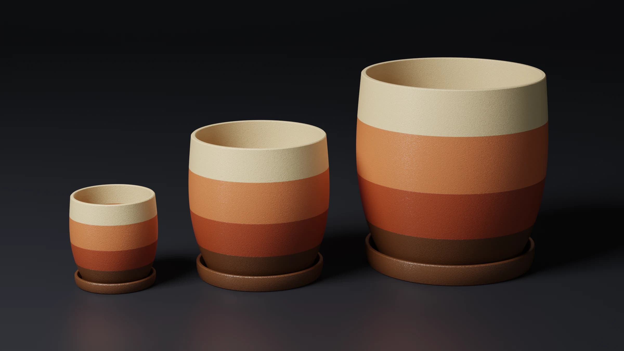 Drie bloempotten in oplopende grootte met banden in ivoor, oranje, terracotta en bruin